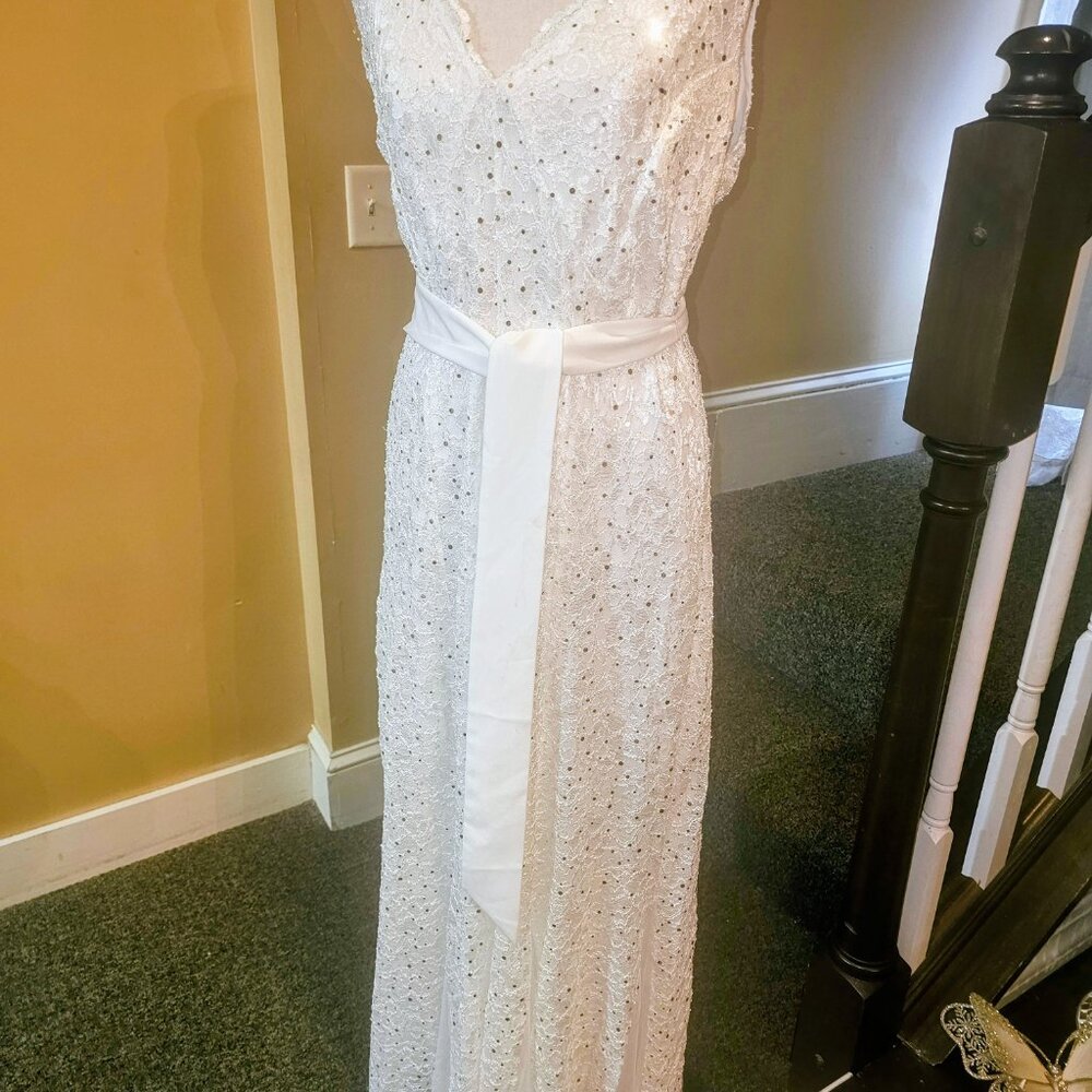 Dress by candalite this is a long dress size is 1x NWOT!!!!!!